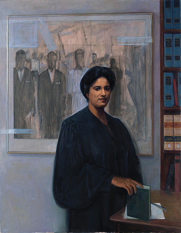 commissioned portrait portraying a dark-haired, robed woman resting a book by its edge to a desk, with a commissioned portrait and book shelf in the background. 