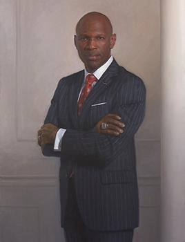 commissioned portrait of a man standing, arms crossed, in a striped suit and tie. 