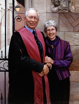 commissioned portrait of a man in regal dress and woman standing together, arms locked and smiling. 