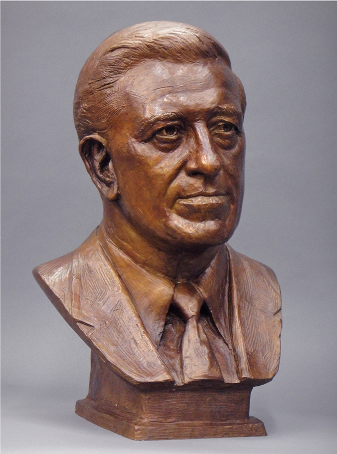 commissioned portrait of bronze-colored bust of a man. 